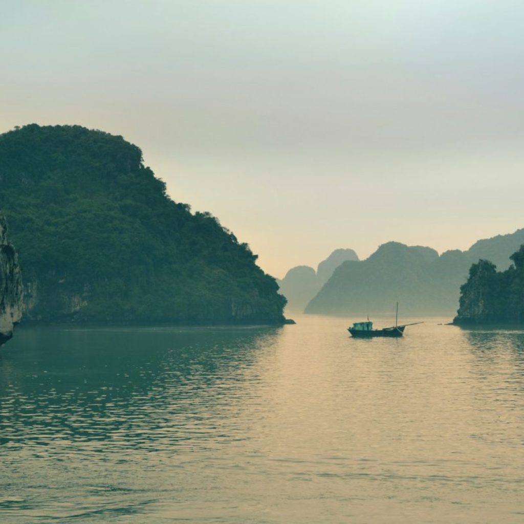outboard boat on body of water