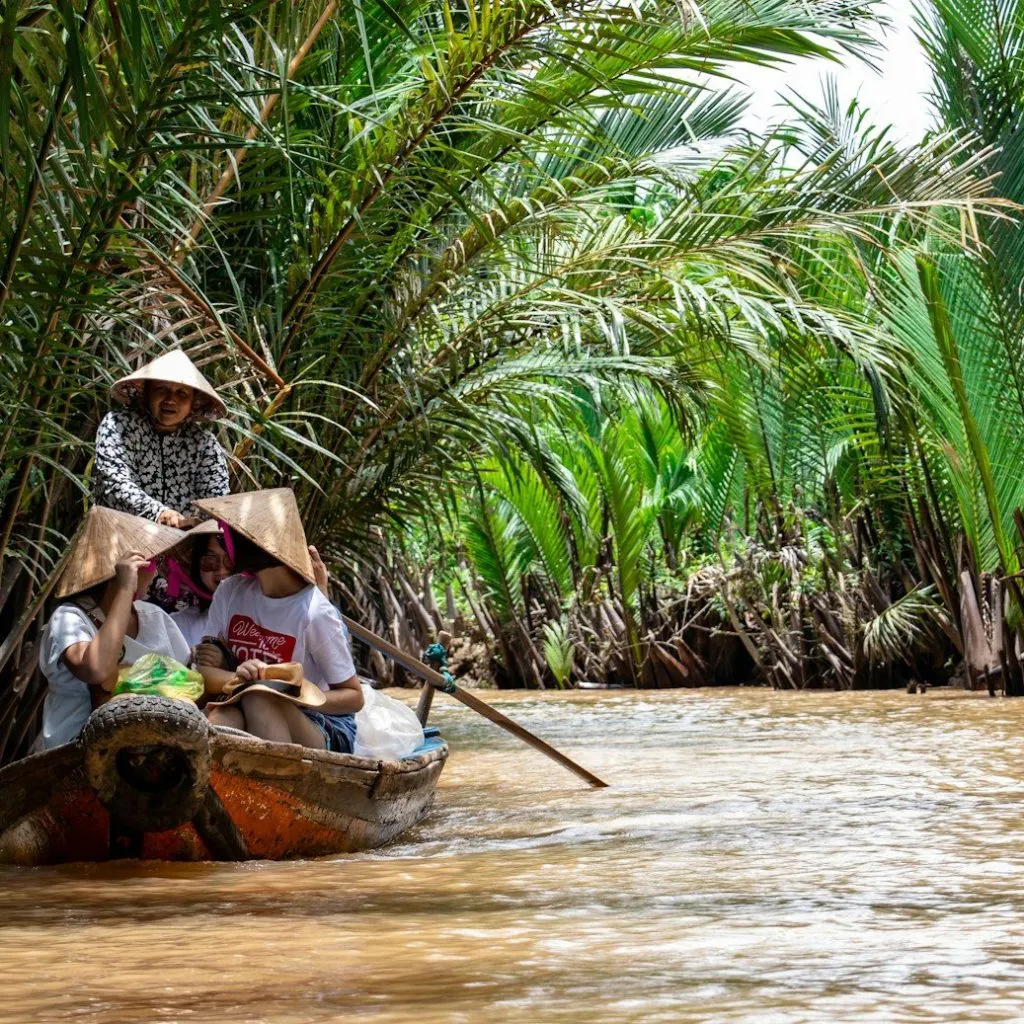 group of people riding on canoe