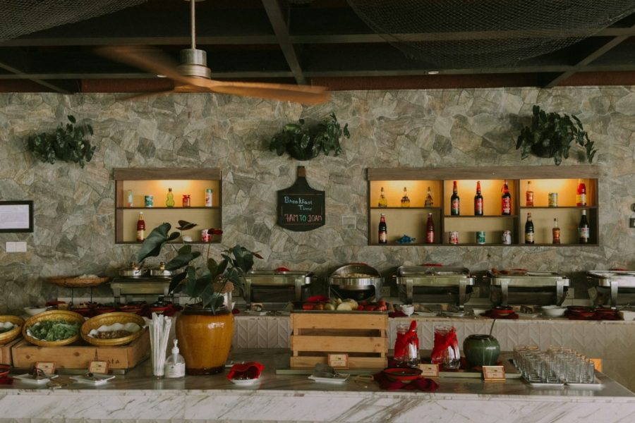 a buffet area with a variety of food items
