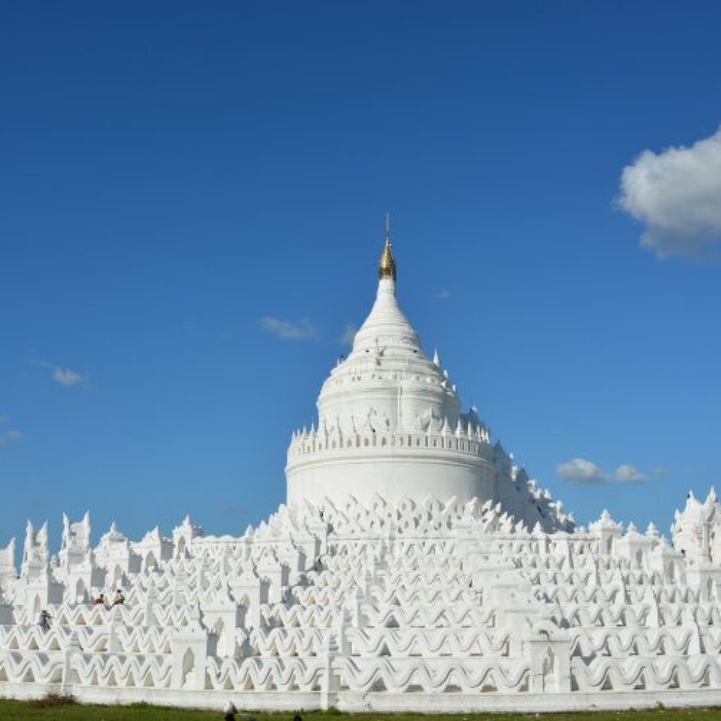 white concrete building under blue sky during daytime