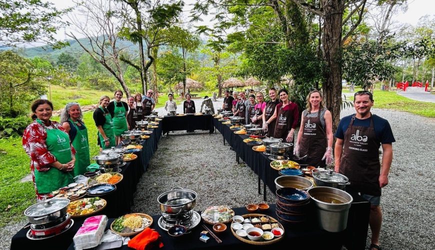 Metta Voyage group cooking class outdoors near Hue