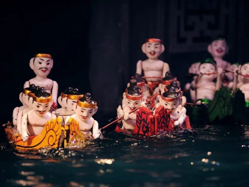 Watching a traditional water puppet show at Thang Long Water Puppet - Things to do in Hanoi