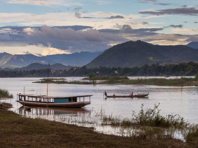 Boats on the Mekong at sunset in Luang Prabang, Laos