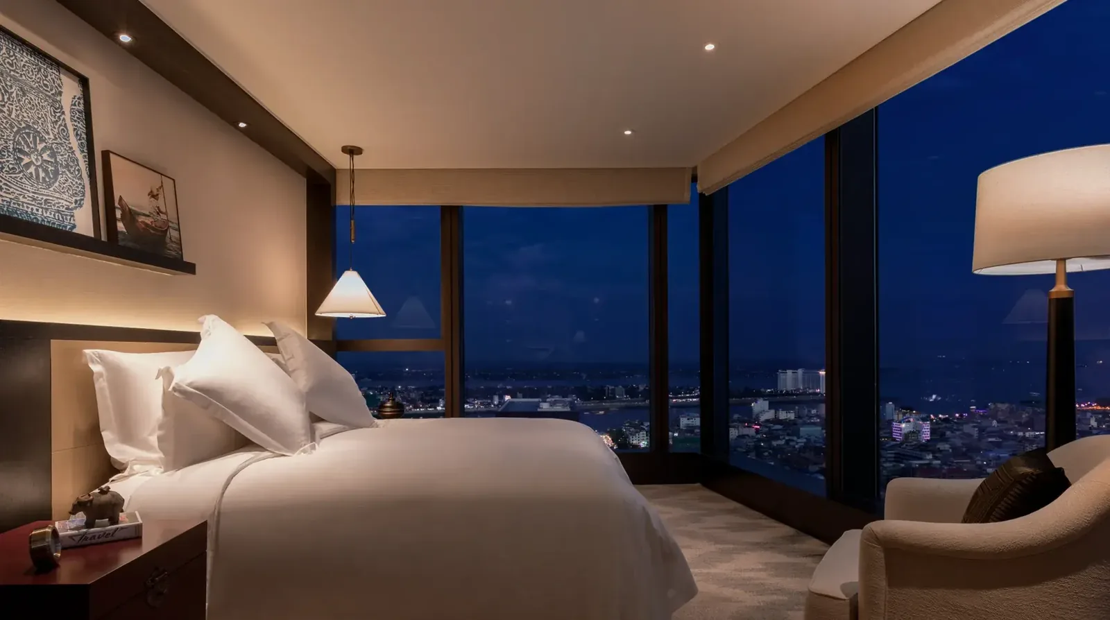 A guest room at Rosewood Phnom Penh with city views