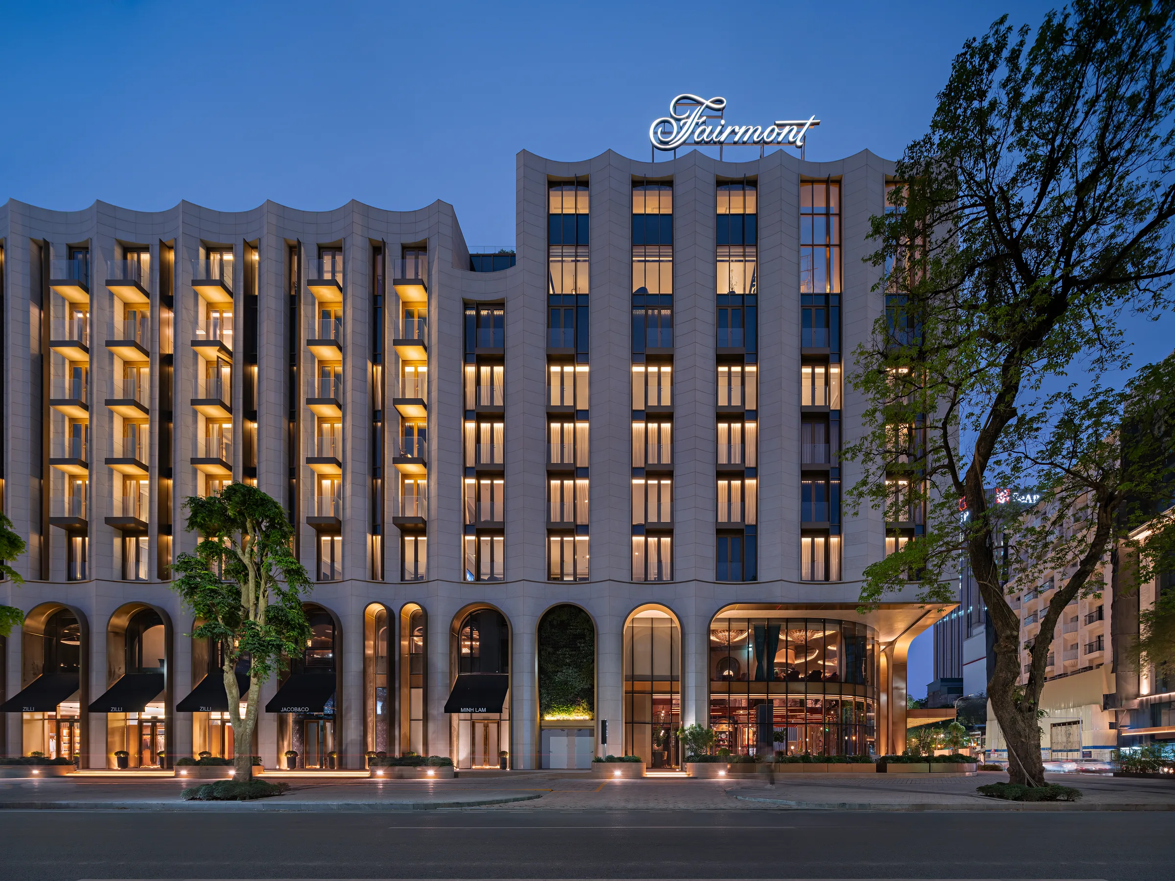 Fairmont Hanoi hotel facade at dusk