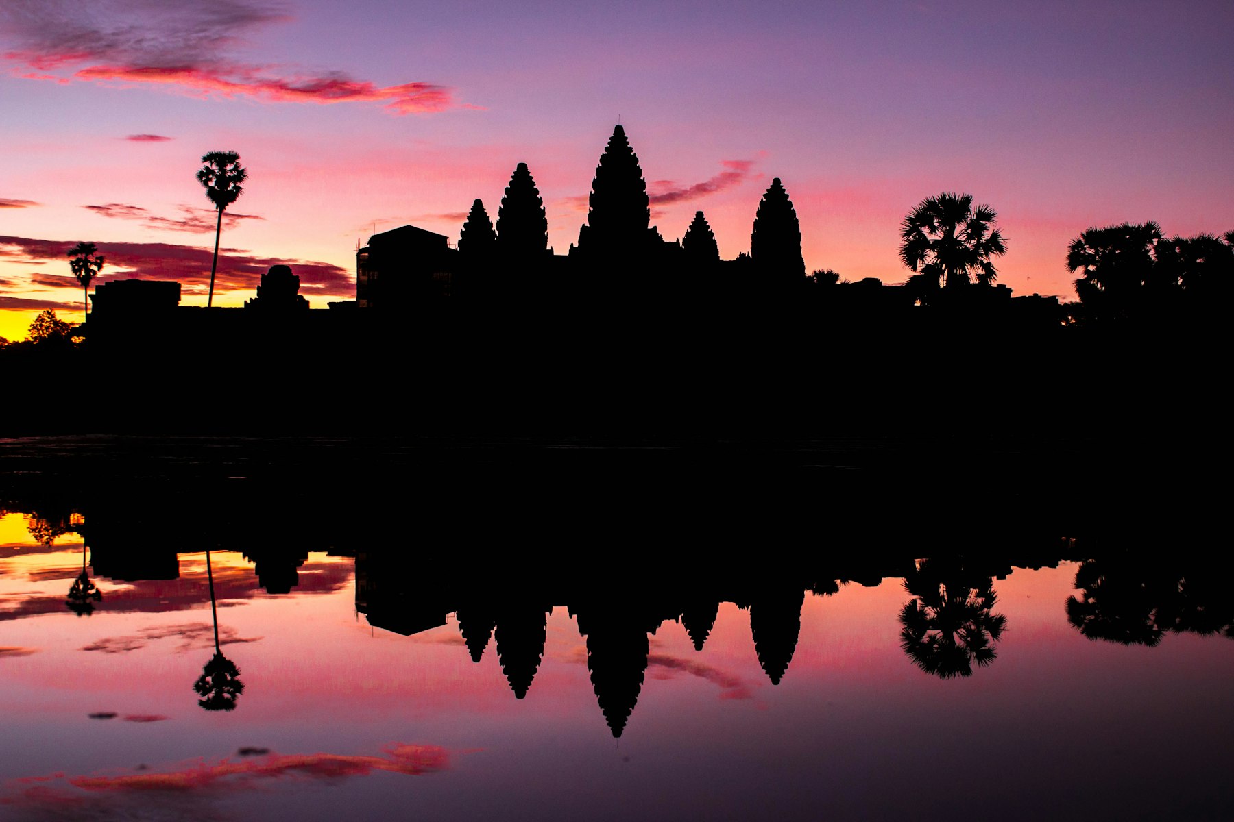 Angkor Wat silhouetted at sunrise