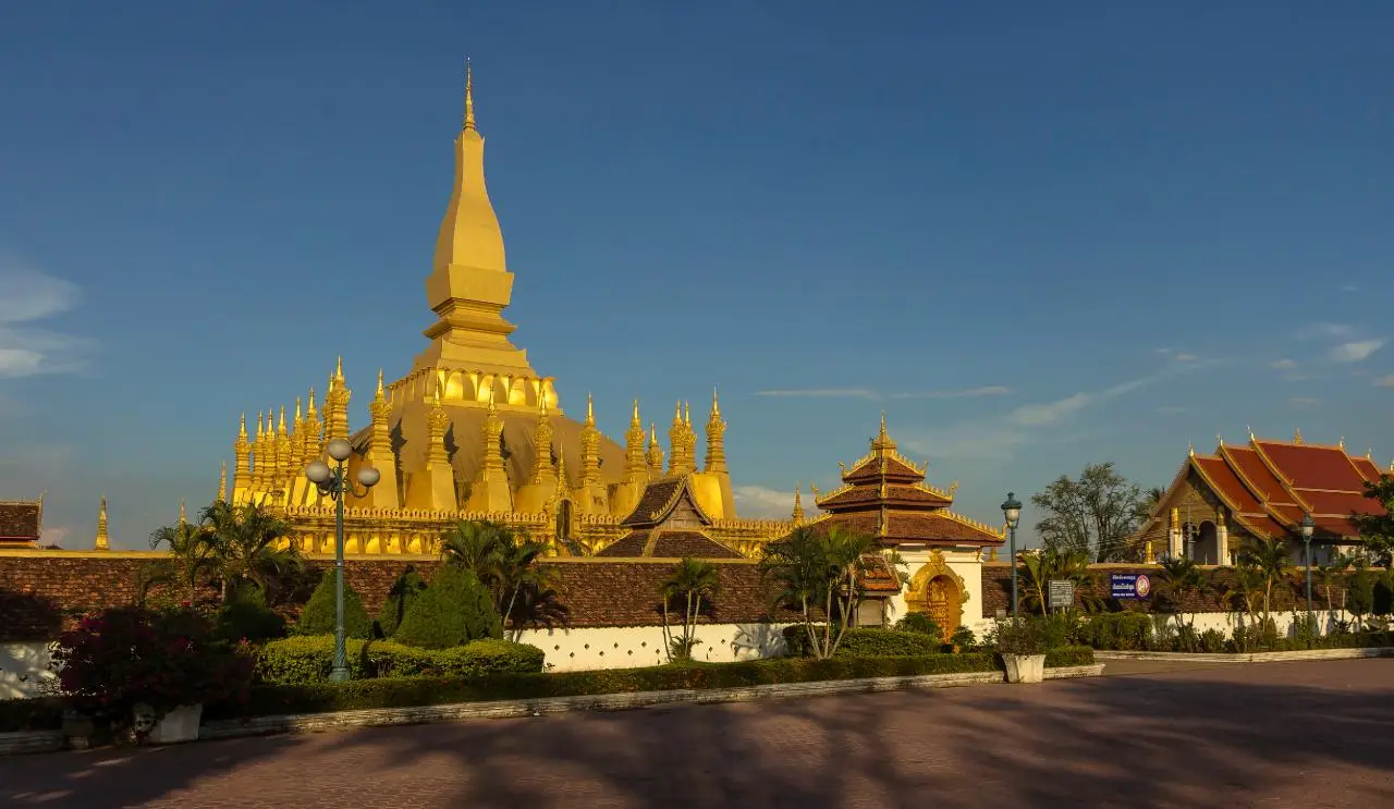 DAY 13: VIENTIANE – BUDDHA PARK – LUANG PRABANG (B)